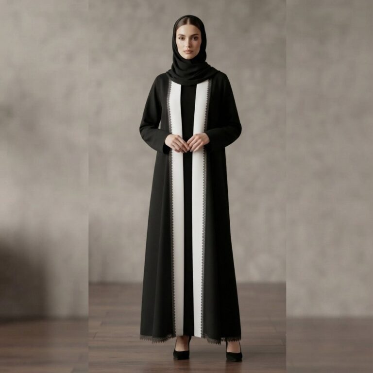 Full length black abaya with white front panel and black lace trim on sleeves and hem